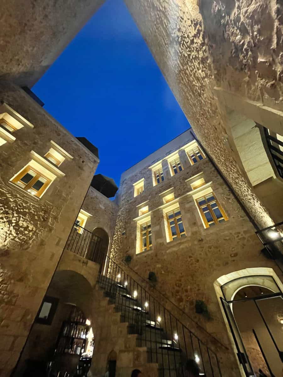 Interior of hotel in Crete perfect for solo travel. All brick with large windows