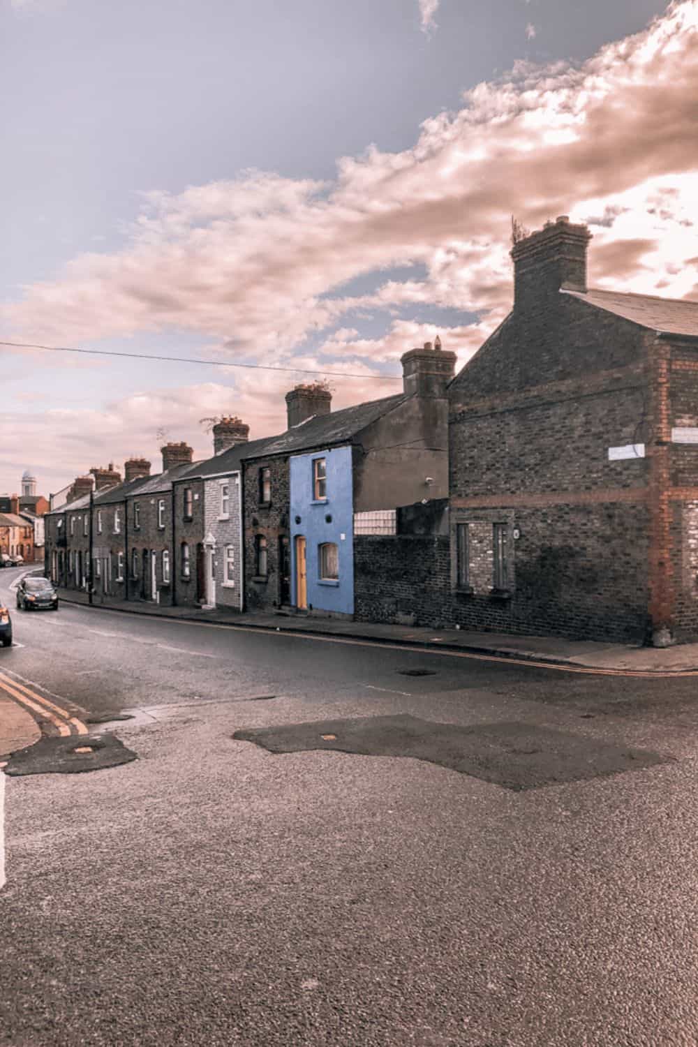Old stone houses lining the streets of Dublin, reflecting the city's historic charm.