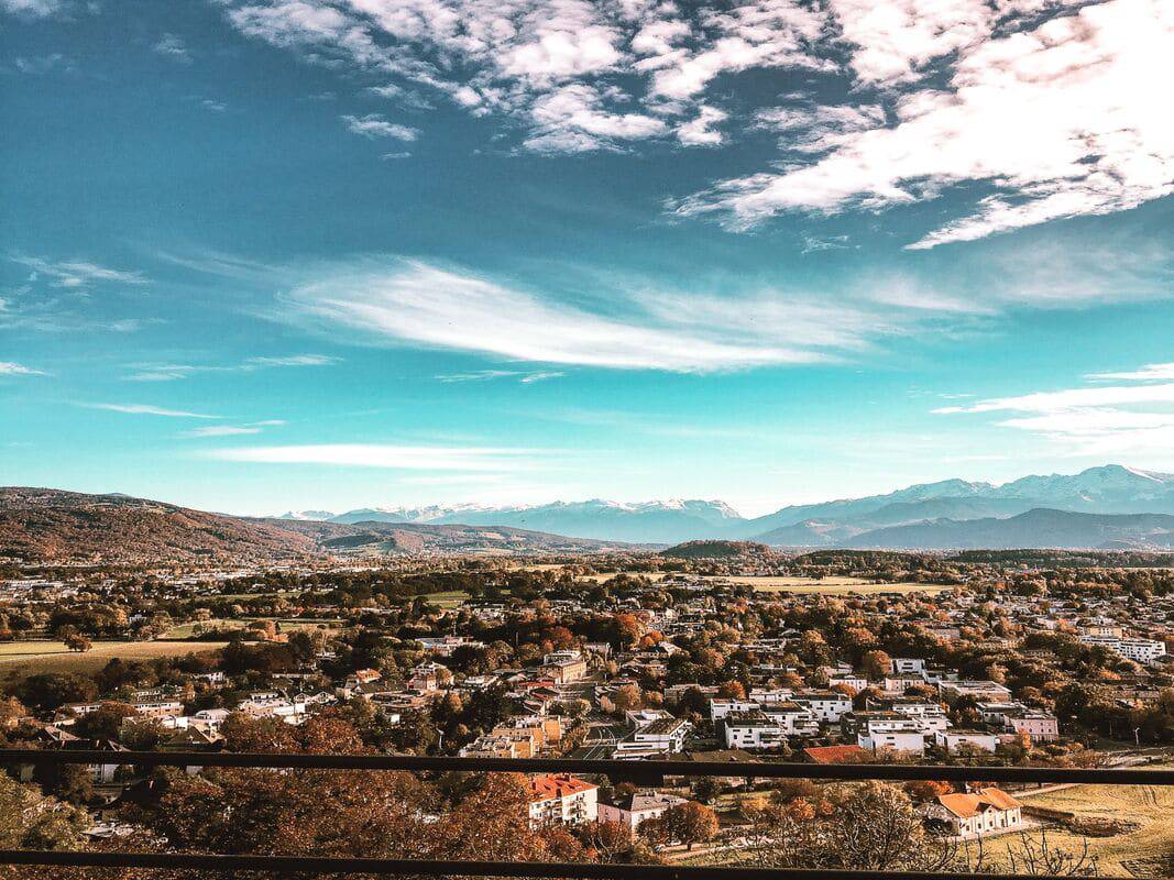 Best Solo Travel Destinations for Women, a sweeping view of Salzburg, Austria, and the surrounding mountains.