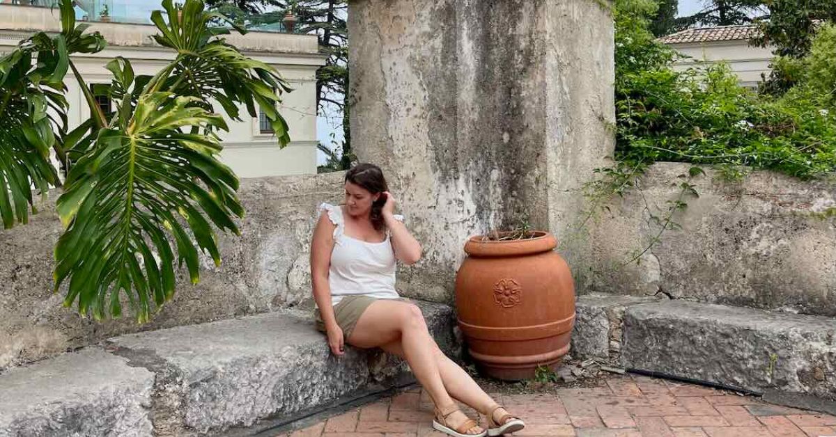 woman sitting alone in Taormina