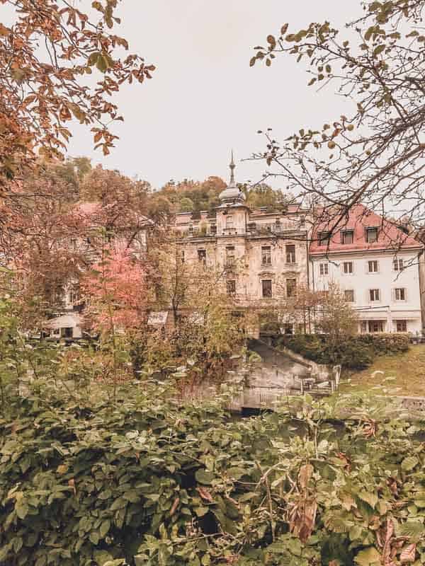A picture of the building and a park in Ljubljana.