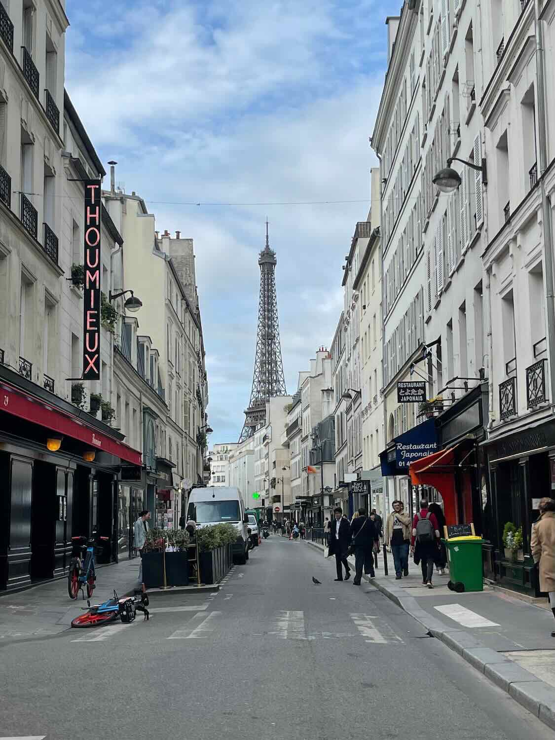 Parisian Street with the Eiffel tower in the background.