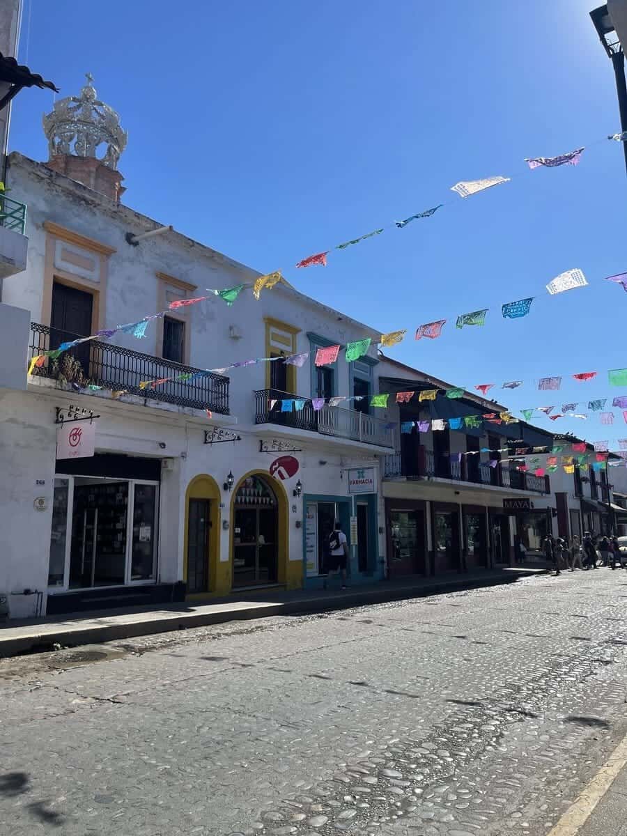The empty streets of Puerto Vallerta with colorful flags 