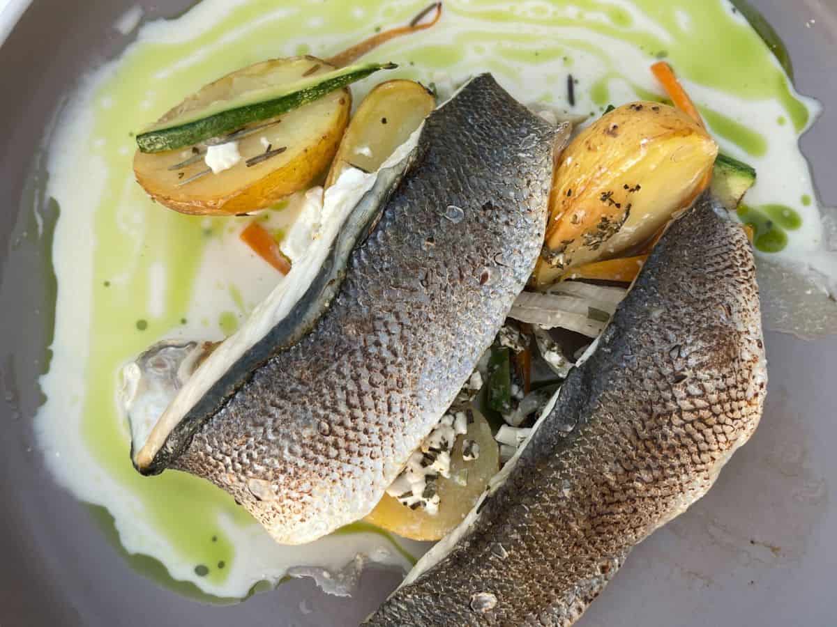 White Fish at Salis on a plate served with veggies