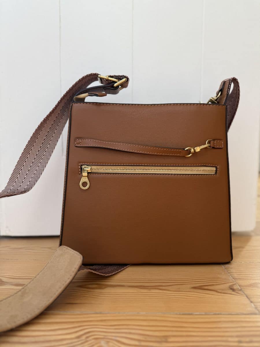 Back of the bag with hidden zippers and gold-tone accents for extra security.