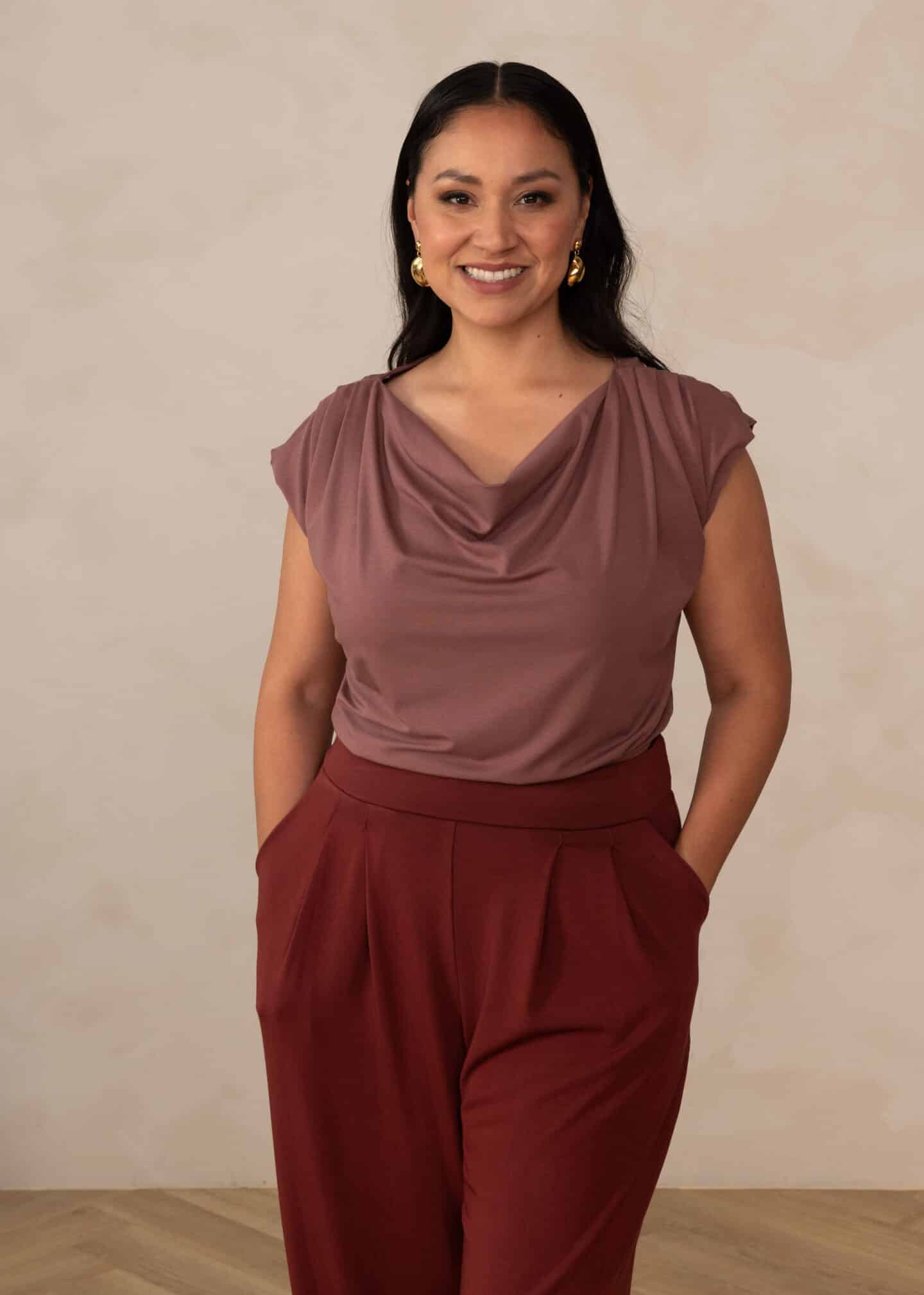 A woman wearing a travel casual outfit from Encircled.