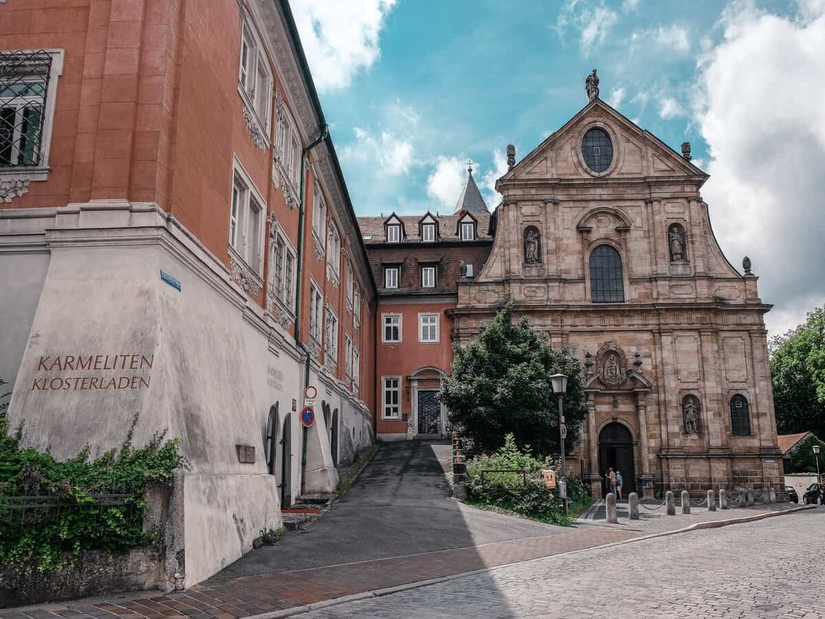 The elegant Karmeliten Klosterladen in Bamberg, showcasing the city's stunning Baroque architecture, .
